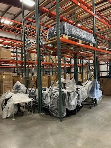 Donated wheelchairs stored inside the FODAC Griffin warehouse